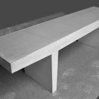 Bench made of gray exposed concrete
